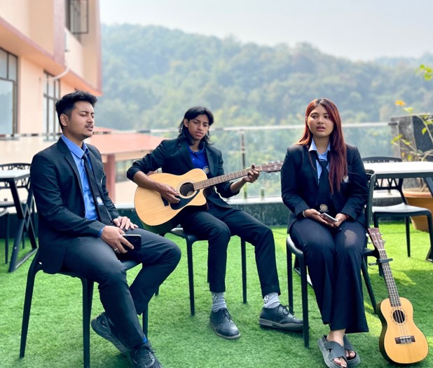 Students playing guitar